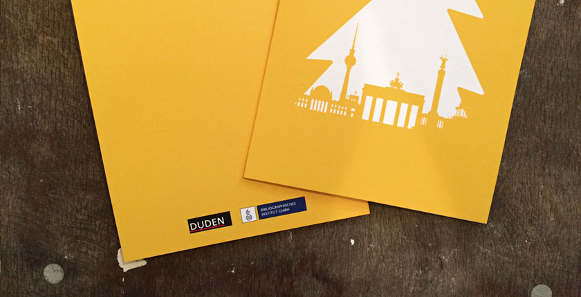 Motivumgestaltung DK513: Gestaltung in Firmenfarben, inklusive Logoaufdruck auf der Rückseite.